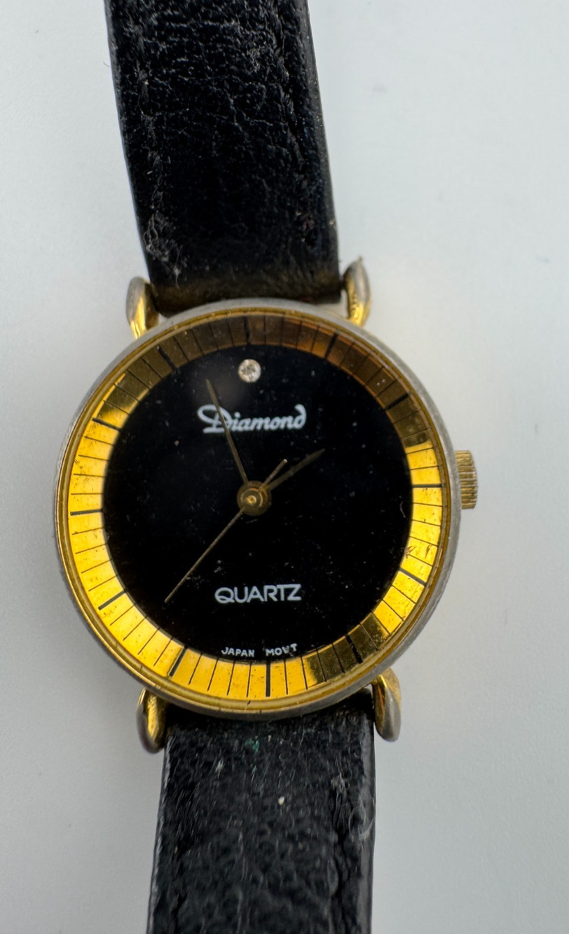Diamond Quartz Watch Black Dial Gold Tone Sunray Bezel Black Leather Band